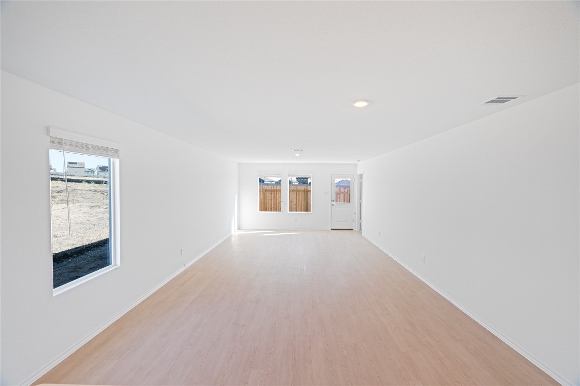 241 Kings Row Lane Jarrell, TX 76537 - Photo 10 of 27 an empty room with windows and closet