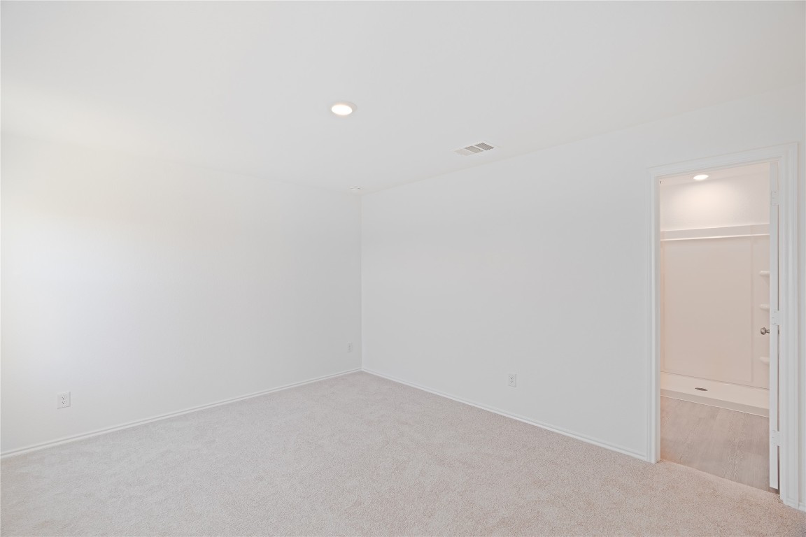241 Kings Row Lane Jarrell, TX 76537 - Photo 11 of 27 a view of an empty room