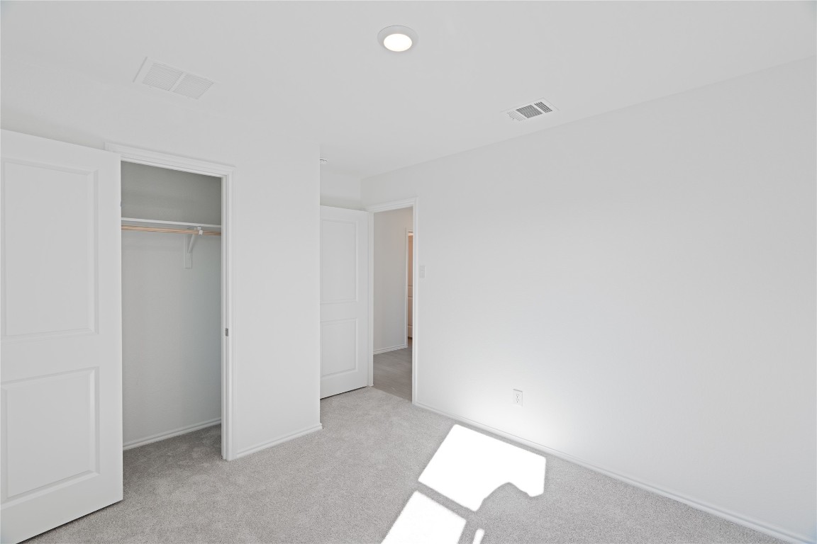 241 Kings Row Lane Jarrell, TX 76537 - Photo 18 of 27 a view of an empty room