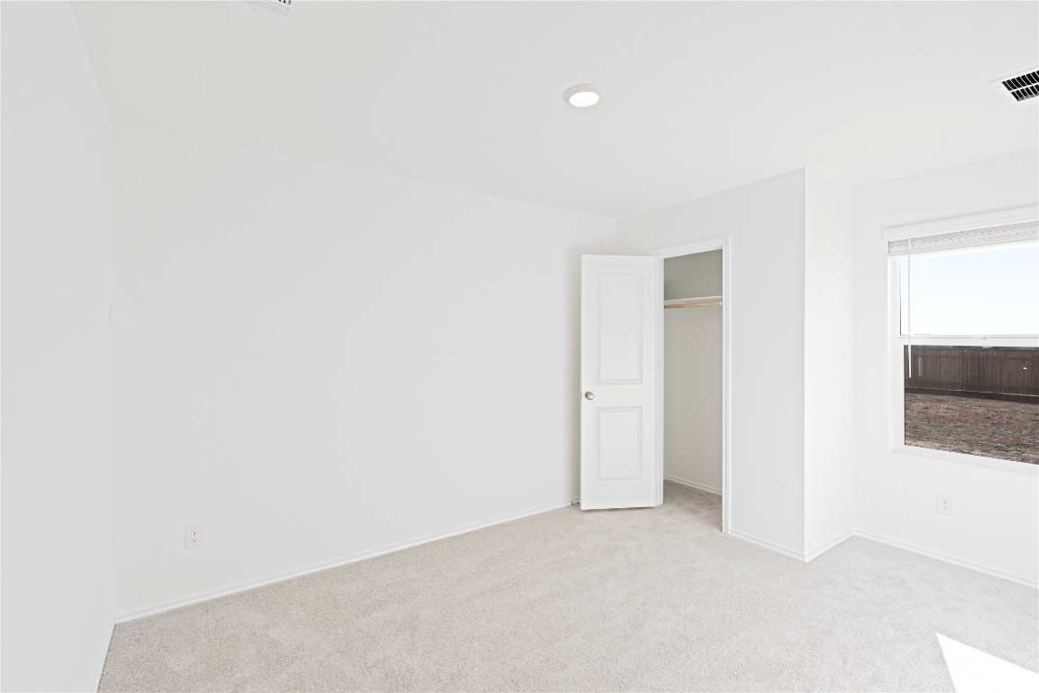 241 Kings Row Lane Jarrell, TX 76537 - Photo 19 of 27 a view of an empty room