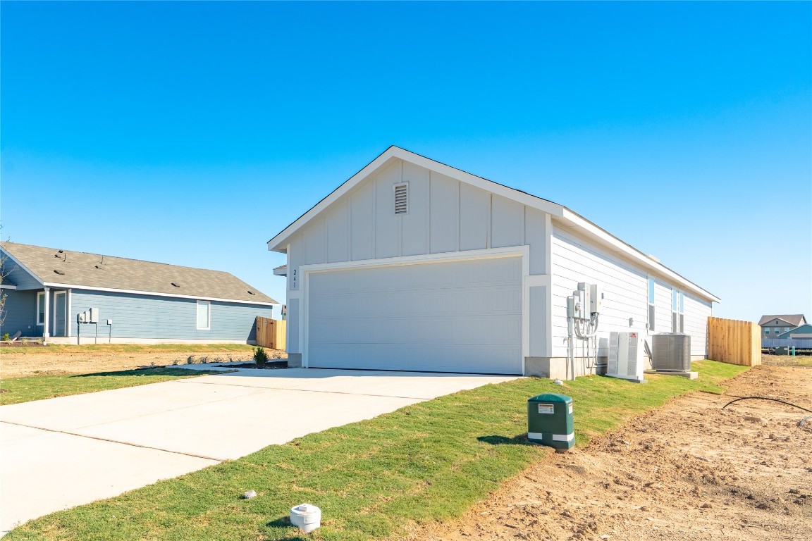 241 Kings Row Lane Jarrell, TX 76537 - Photo 2 of 27 a house view with a outdoor space