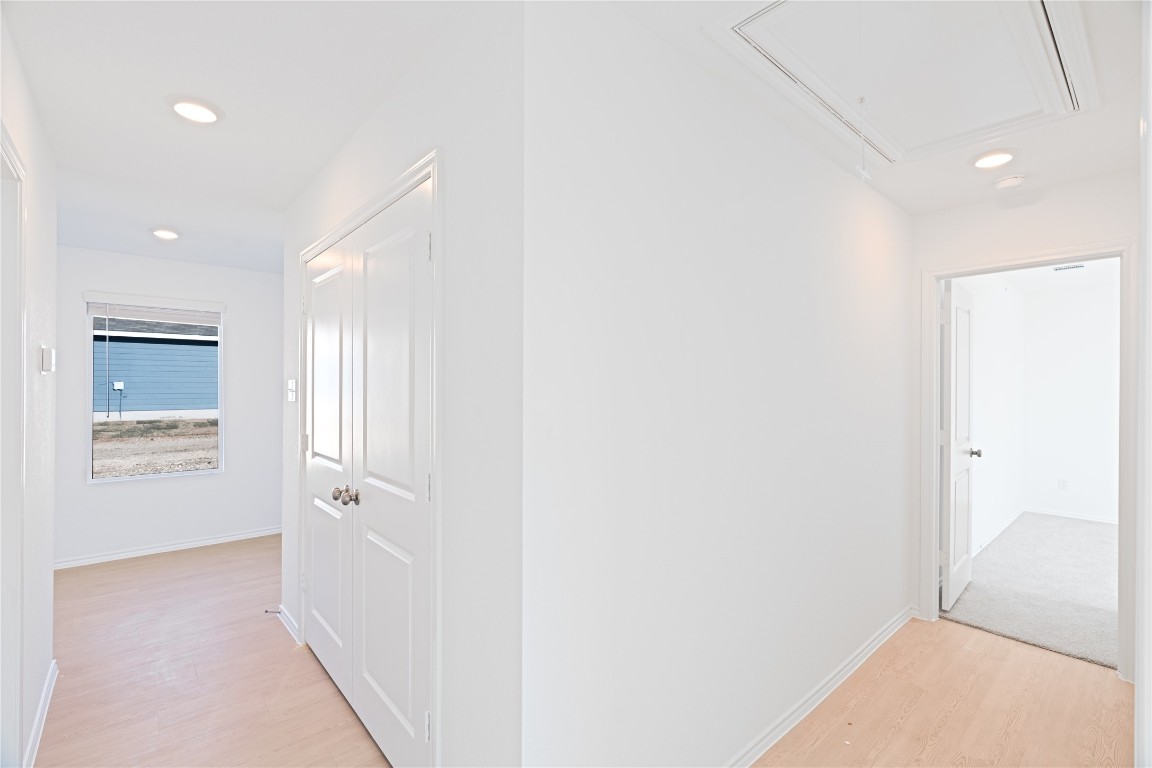241 Kings Row Lane Jarrell, TX 76537 - Photo 21 of 27 a view of a hallway with windows