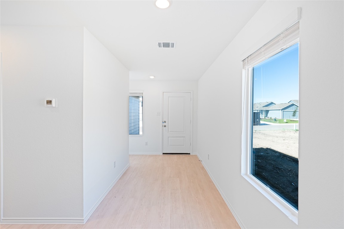 241 Kings Row Lane Jarrell, TX 76537 - Photo 4 of 27 a view of an empty room