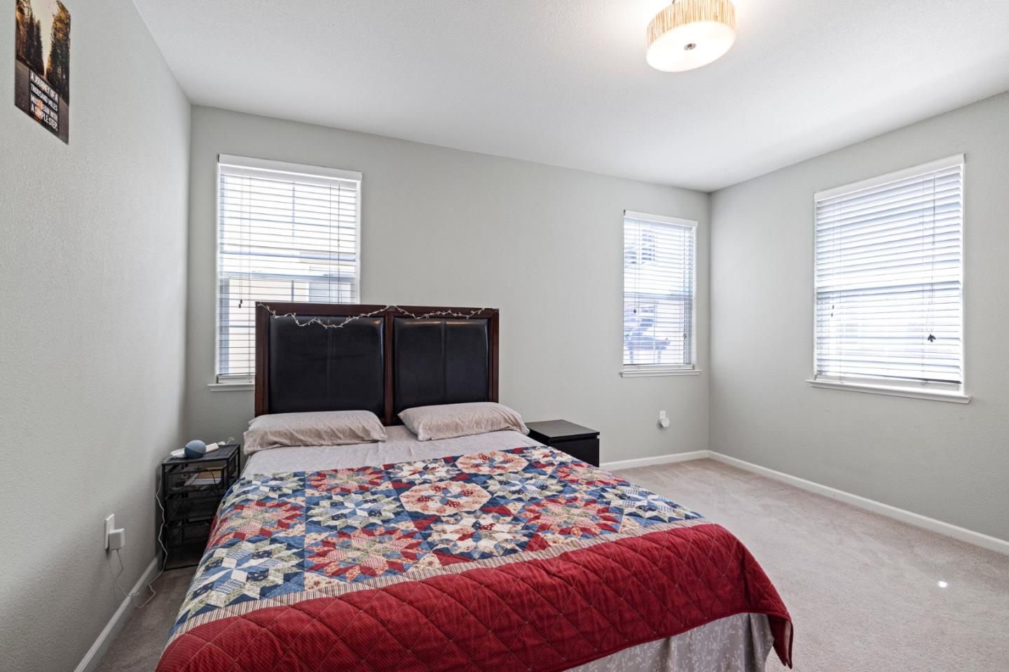 760 Mente Linda Loop Milpitas, CA 95035 - Photo 15 of 24 a bedroom with a large bed and a window