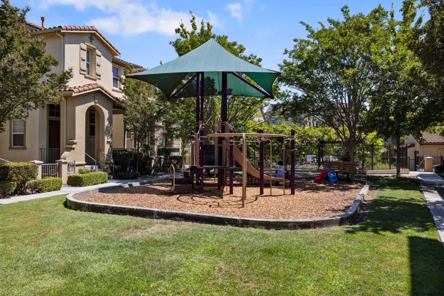 760 Mente Linda Loop Milpitas, CA 95035 - Photo 3 of 24 a view of a house with backyard porch and sitting area