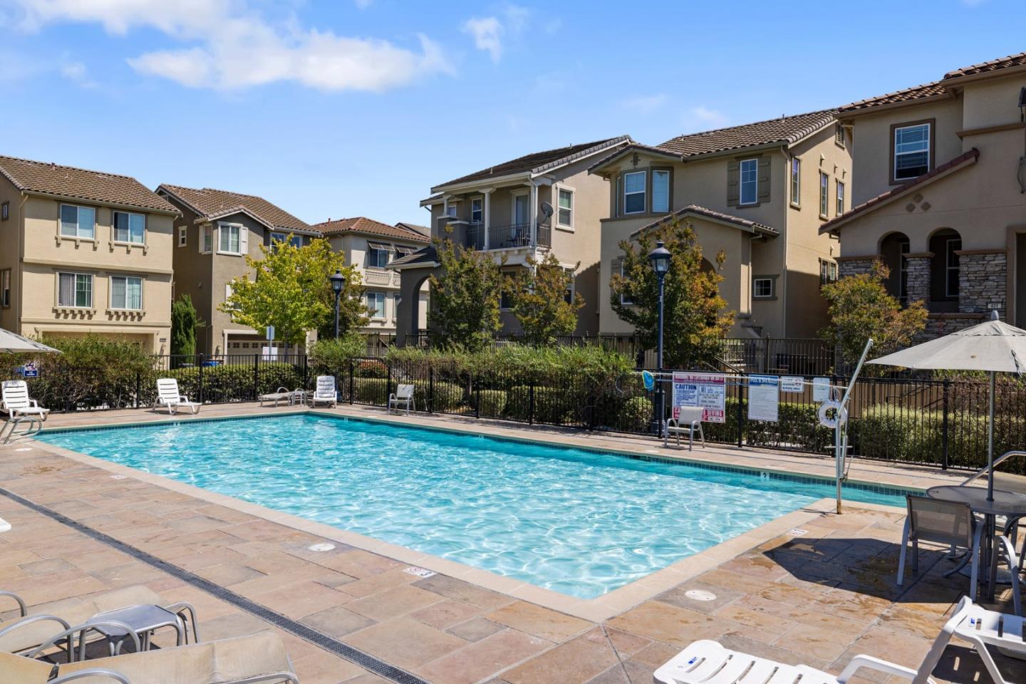 760 Mente Linda Loop Milpitas, CA 95035 - Photo 4 of 24 a front view of a house with garden