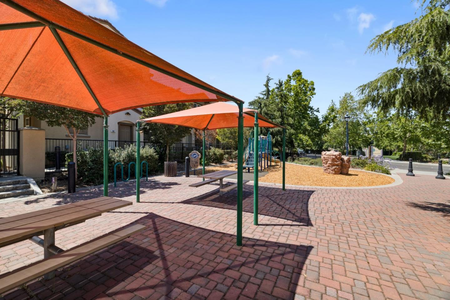 760 Mente Linda Loop Milpitas, CA 95035 - Photo 6 of 24 a view of a swimming pool with a patio