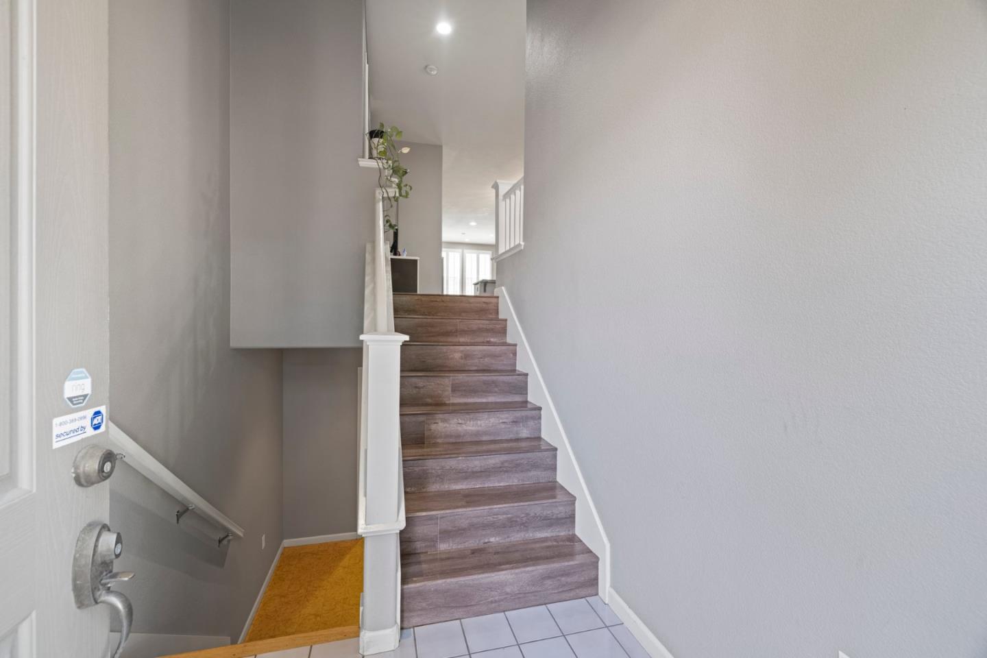 760 Mente Linda Loop Milpitas, CA 95035 - Photo 8 of 24 a view of a hallway with staircase