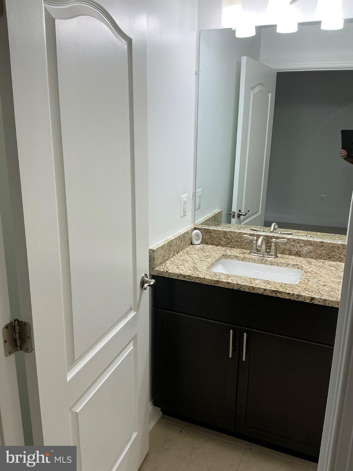16125 Redland Road Derwood, MD 20855 - Photo 21 of 44 Sleek bathroom with modern finishes.