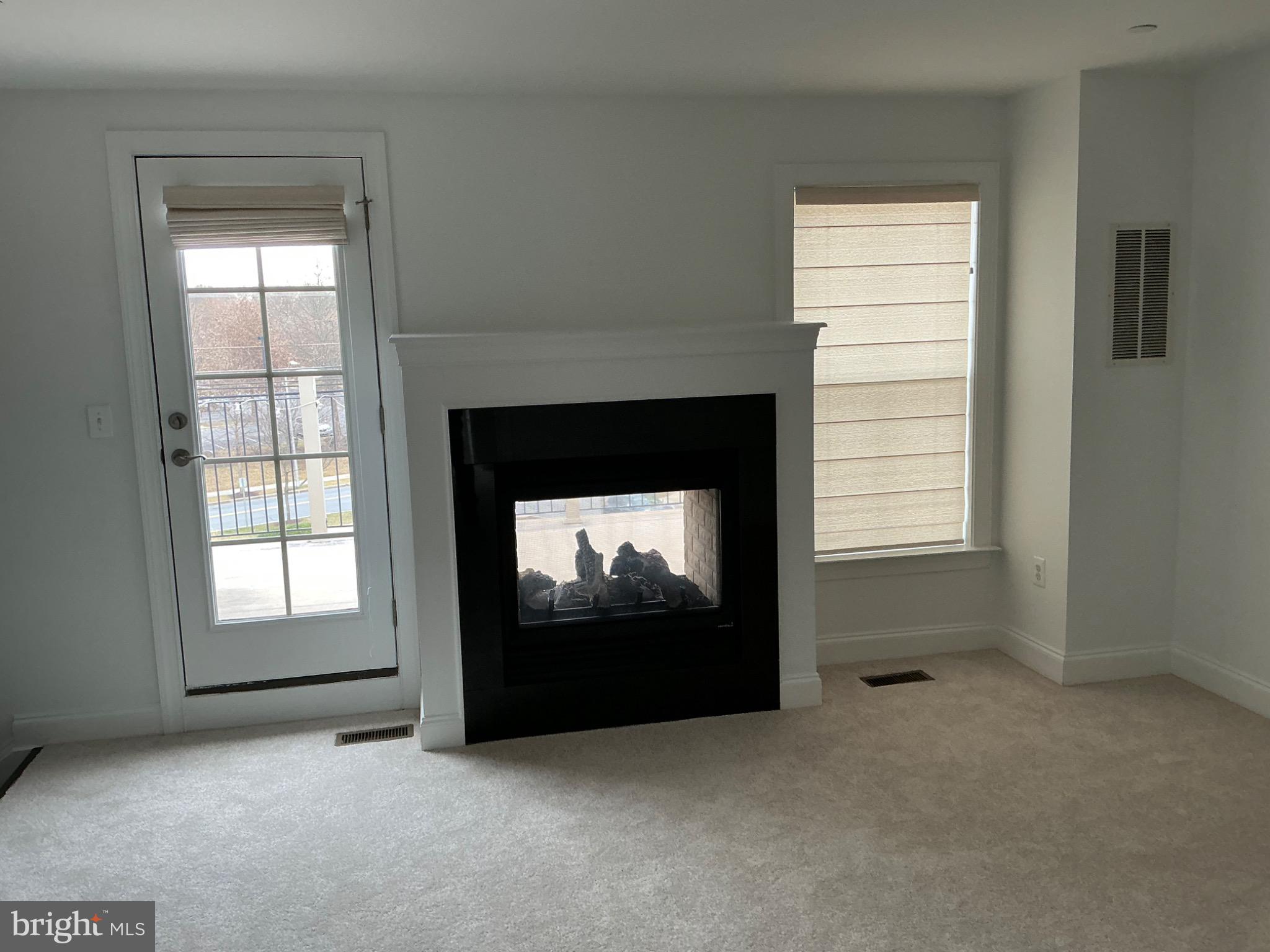 16125 Redland Road Derwood, MD 20855 - Photo 37 of 44 Cozy living space with modern fireplace.