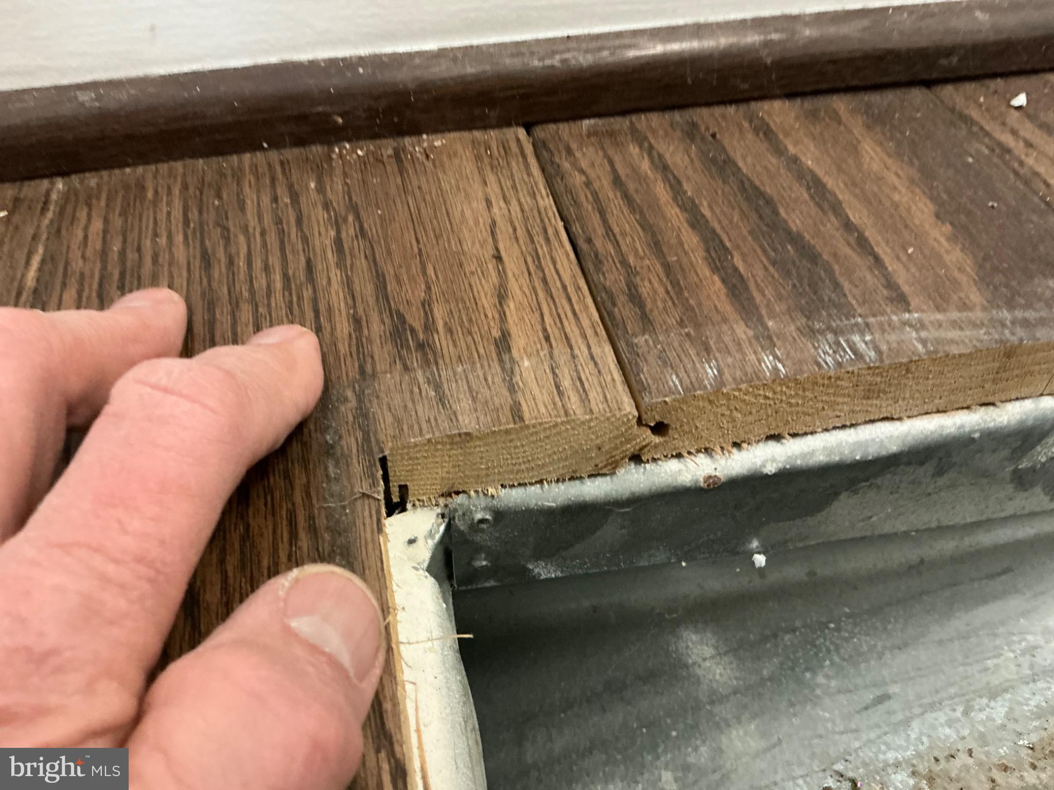 16125 Redland Road Derwood, MD 20855 - Photo 39 of 44 Flooring detail reveals solid hardwood quality.