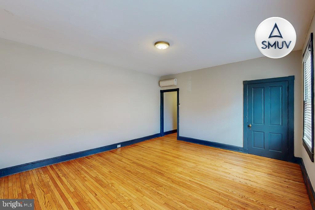 24 East Madison Street, Unit EF Baltimore, MD 21202 - Photo 11 of 23 an empty room with a window
