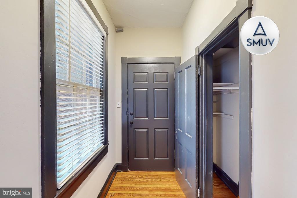 24 East Madison Street, Unit EF Baltimore, MD 21202 - Photo 6 of 23 a view of a hallway with elevator