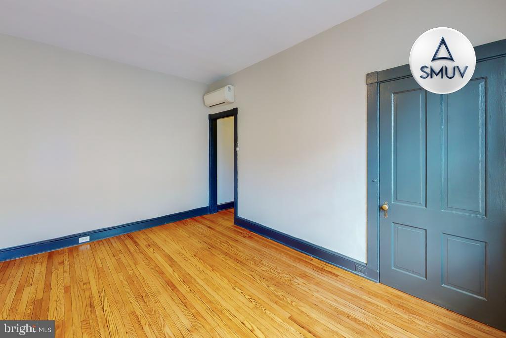 24 East Madison Street, Unit EF Baltimore, MD 21202 - Photo 10 of 23 a view of a hallway with a large window