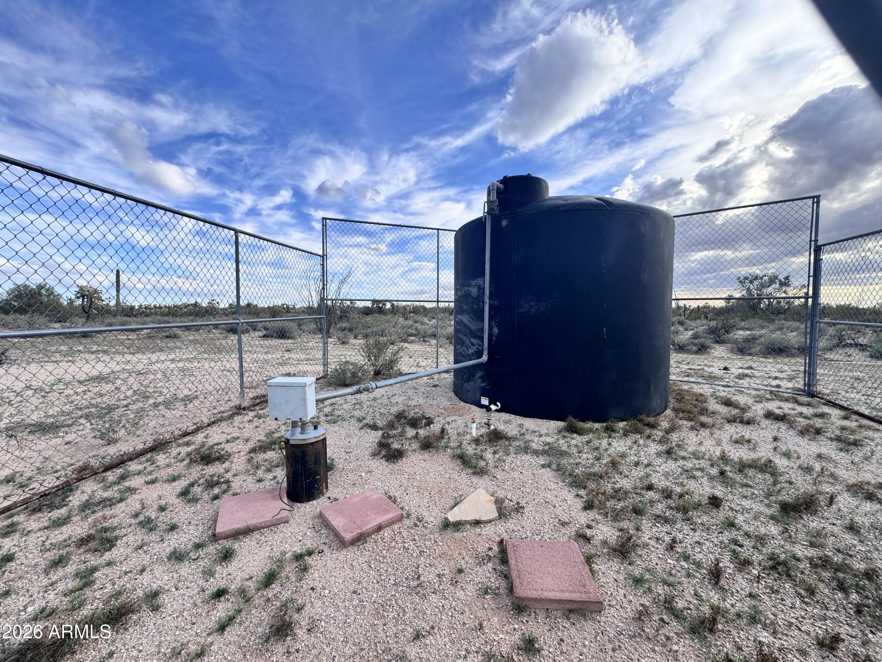 14438 North Reed Road Florence, AZ 85132 - Photo 3 of 28 a view of a backyard of the house