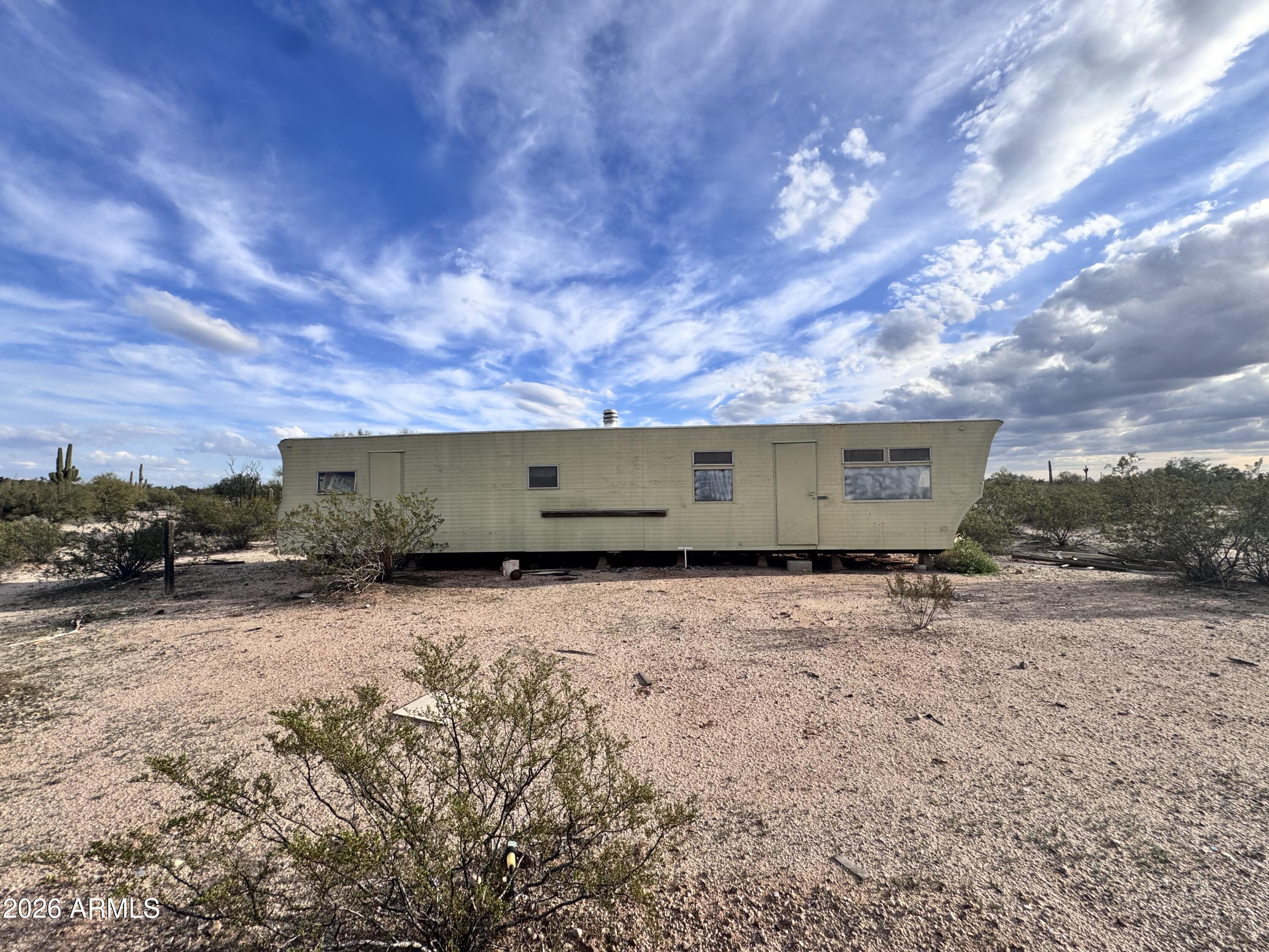 14438 North Reed Road Florence, AZ 85132 - Photo 6 of 28 a view of backyard and car parked