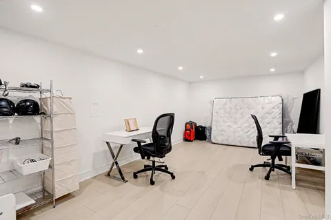 a view of a workspace with furniture