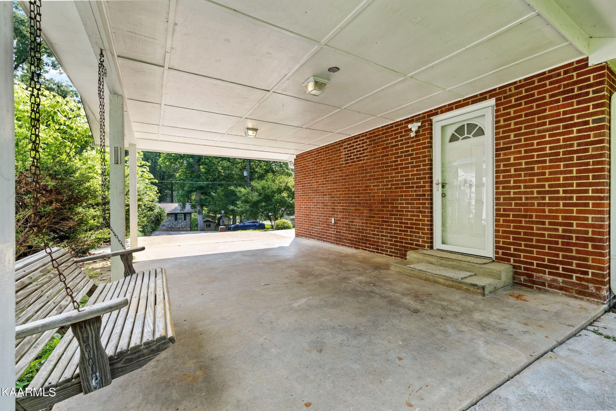 107 Forest Circle Powell, TN 37849 - Photo 13 of 14 a view of a porch with a door