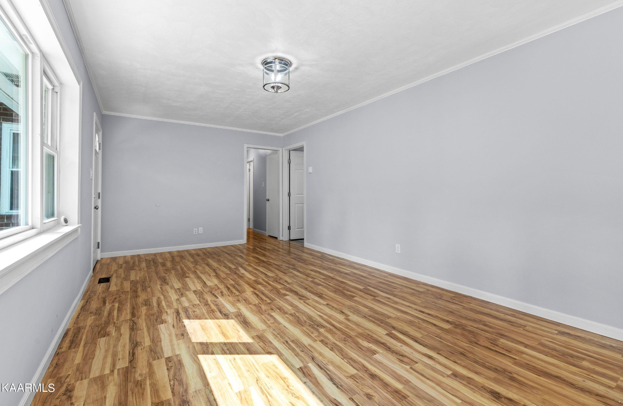 107 Forest Circle Powell, TN 37849 - Photo 3 of 14 a view of an empty room and wooden floor
