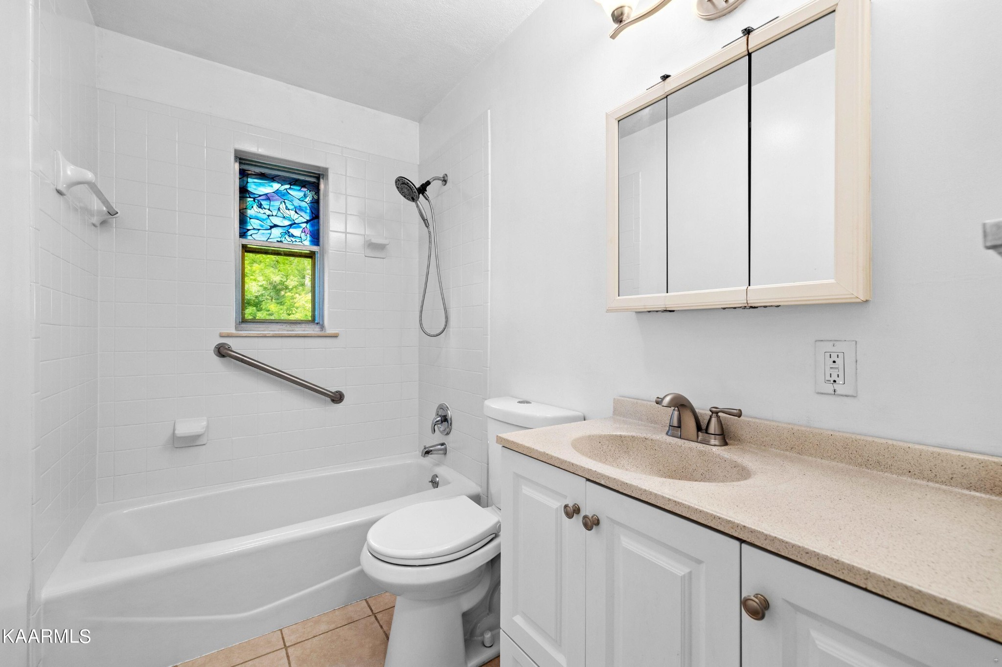 107 Forest Circle Powell, TN 37849 - Photo 7 of 14 a bathroom with a sink a toilet and bathtub
