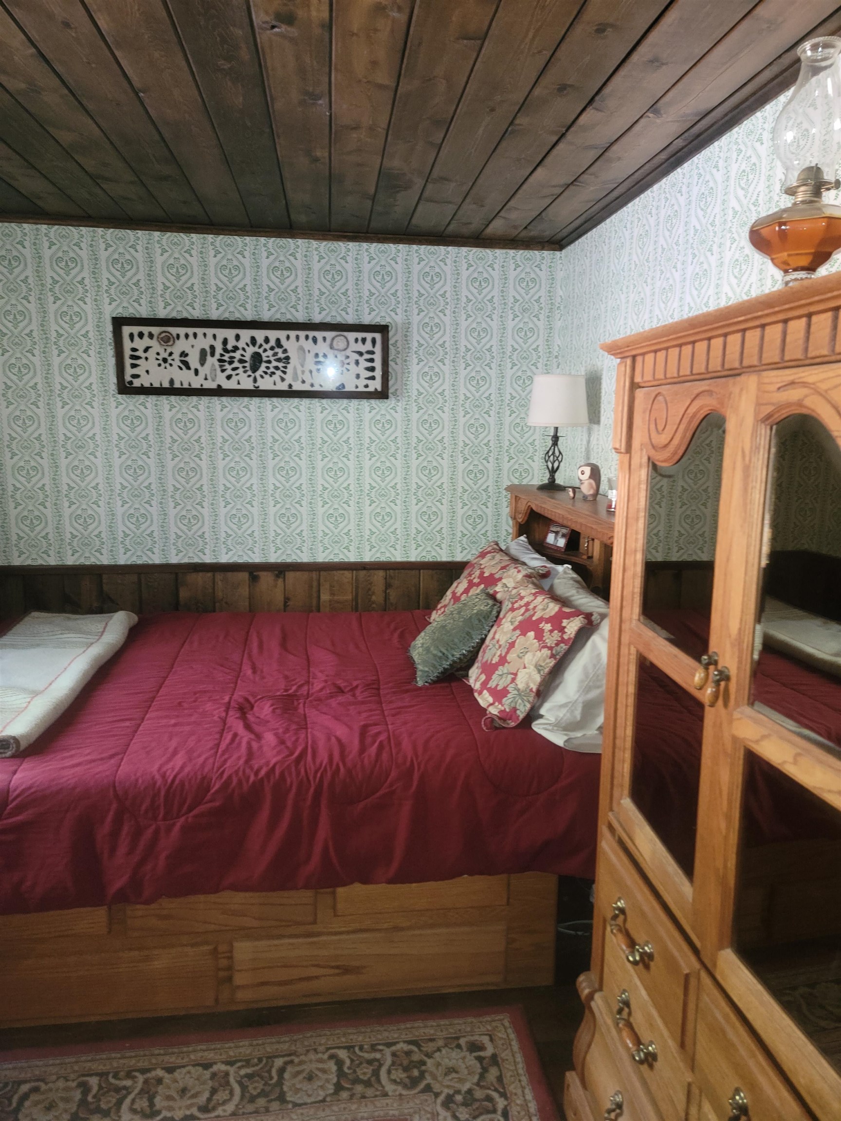 11702 Twin Lakes Road Bridgeport, CA 93517 - Photo 20 of 21 Wood-paneled ceiling with light-patterned wallpaper