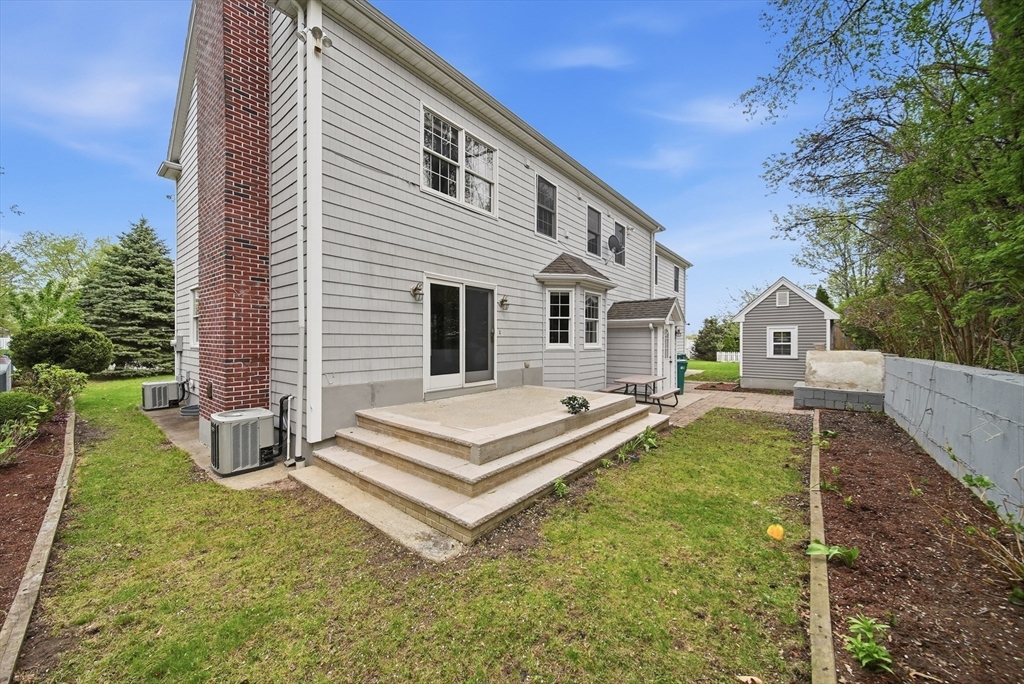 131 Range Heights Road Lynn, MA 01904 - Photo 35 of 36 a view of a house with pool and chairs