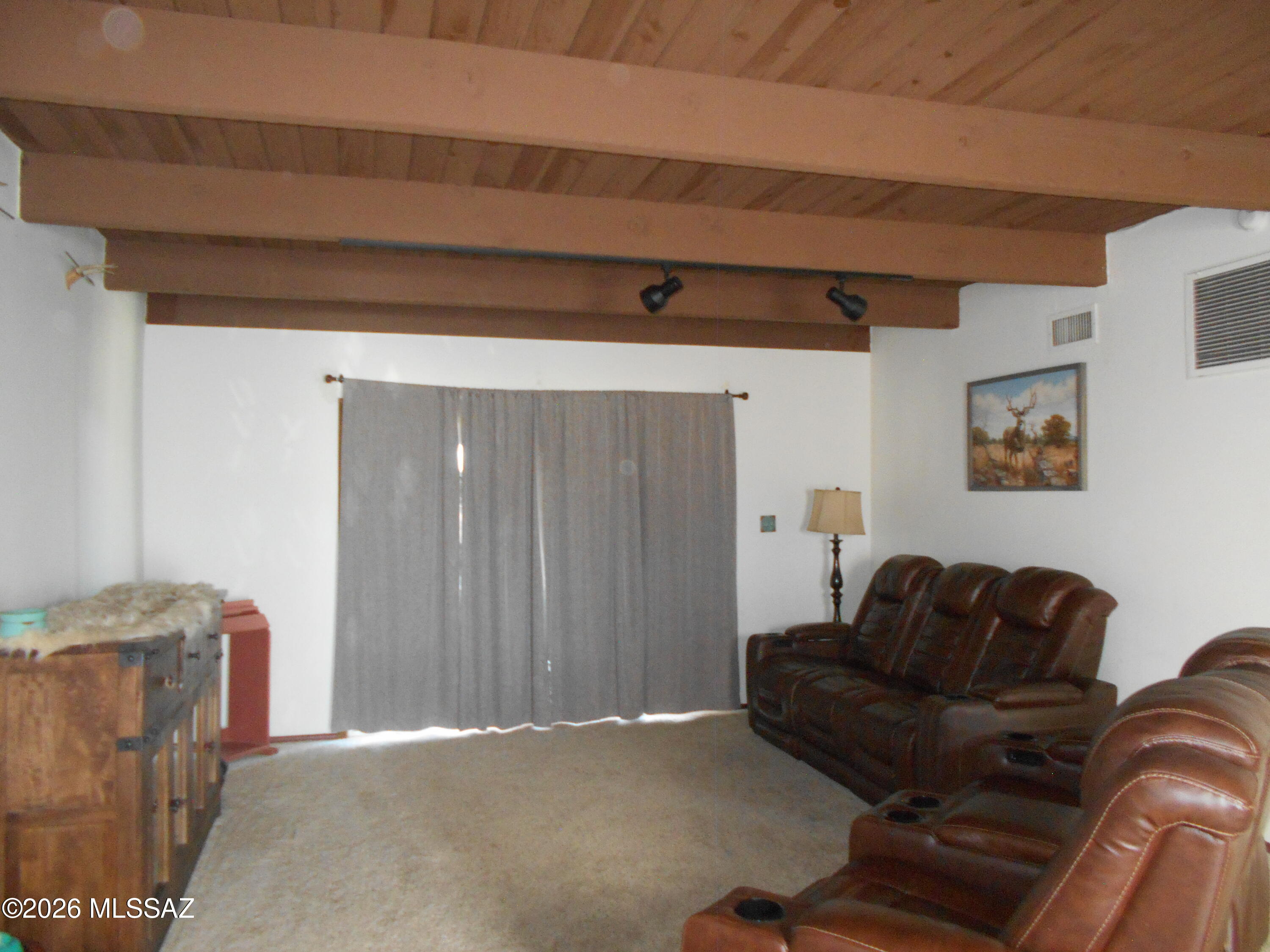1201 East Old Stewart Road Willcox, AZ 85643 - Photo 14 of 49 a living room with furniture a couch and a cabinet