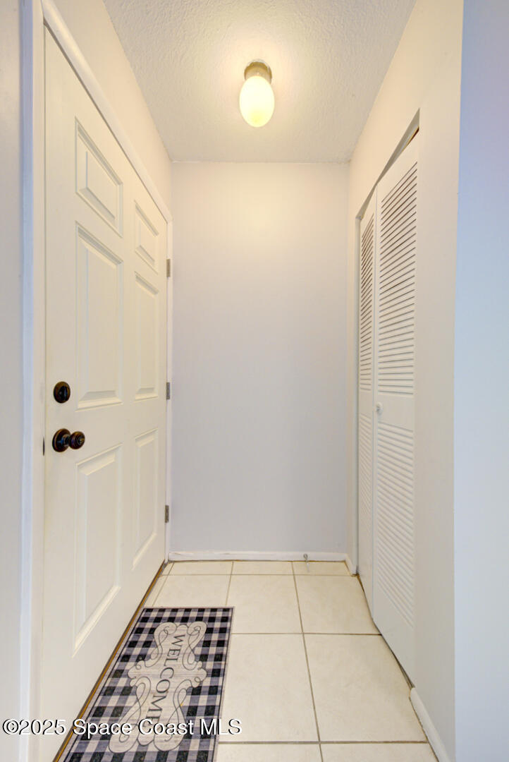 4749 Sisson Road Titusville, FL 32780 - Photo 5 of 30 foyer