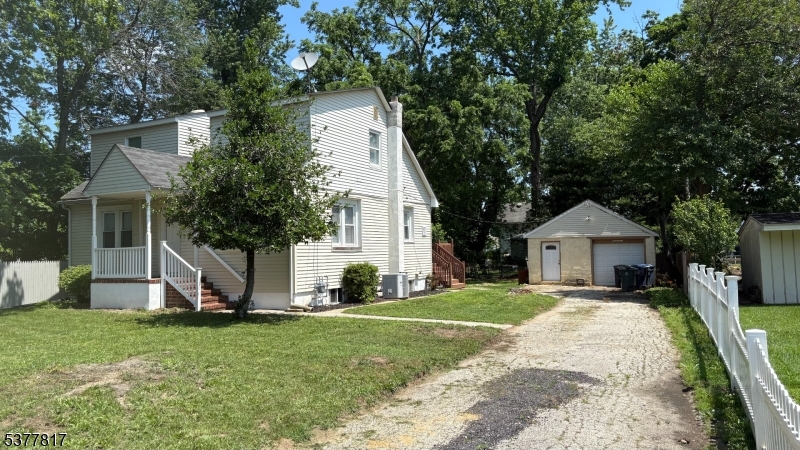 1776 North Tuckahoe Road Williamstown, NJ 08094 - Photo 3 of 16 a front view of a house with a yard and large tree