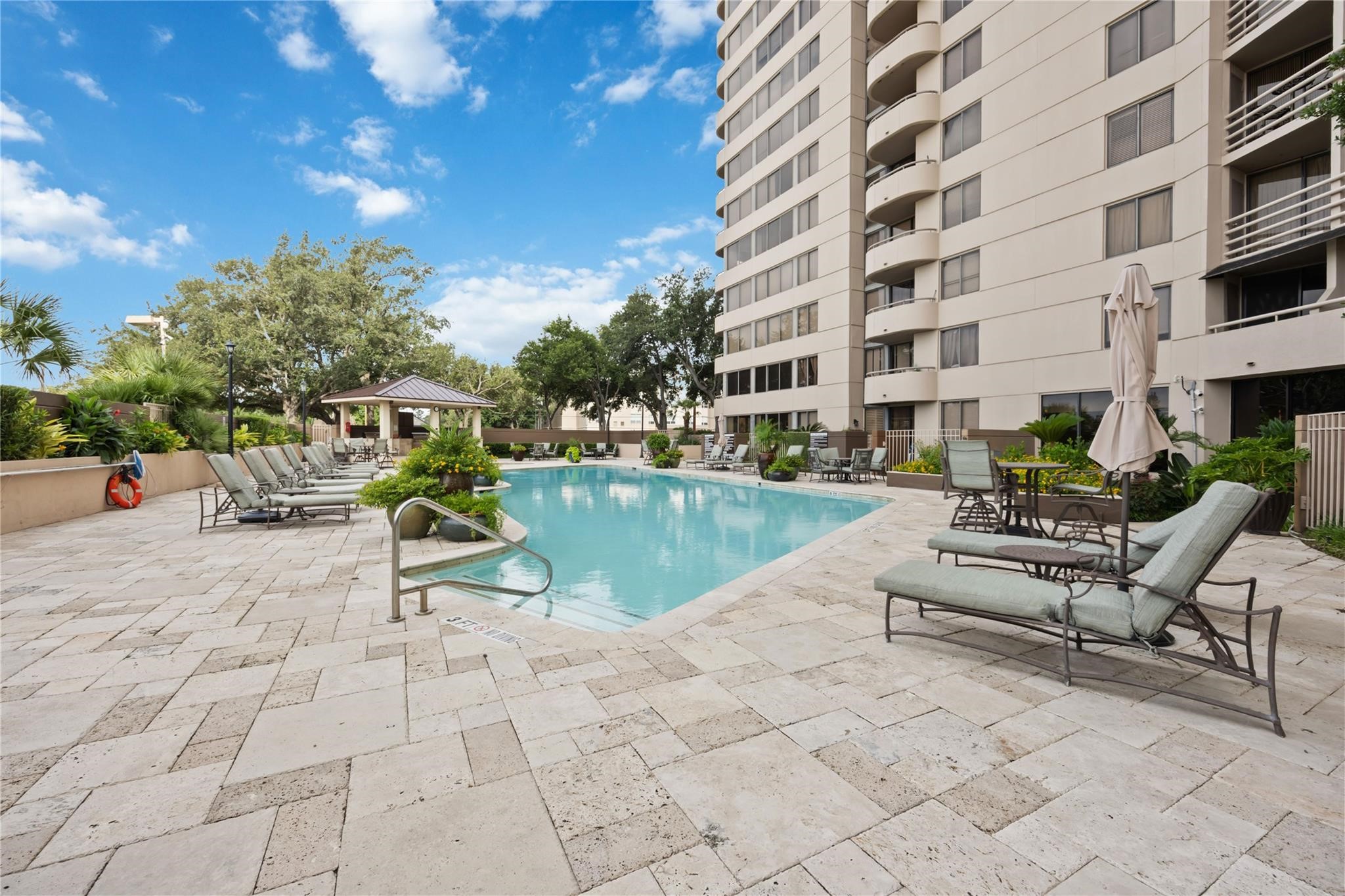 3525 Sage Road, Unit 1713 Houston, TX 77056 - Photo 24 of 25 Resort-style pool perfect for relaxing and entertainment.