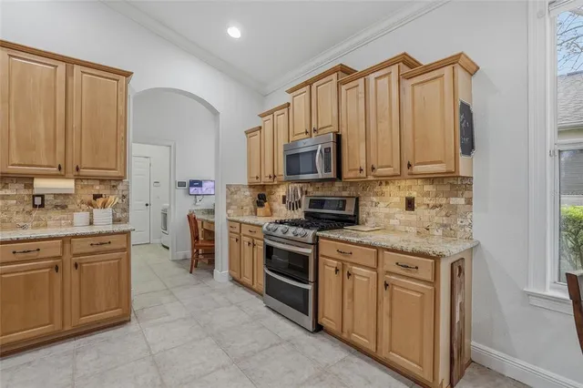 a workspace with furniture and a window