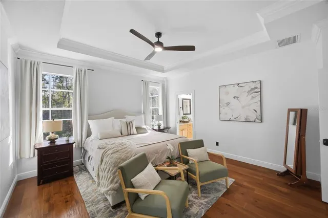 a bathroom with a sink a mirror and a window