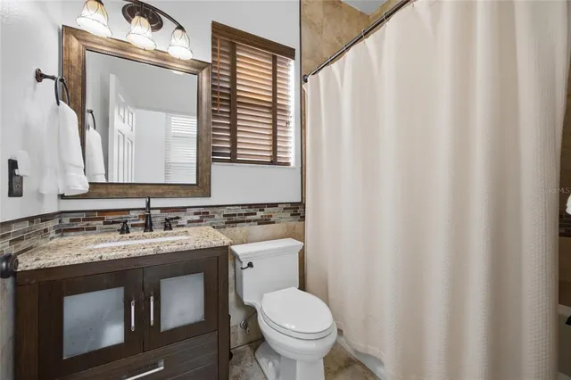 a view of a trees with basketball court