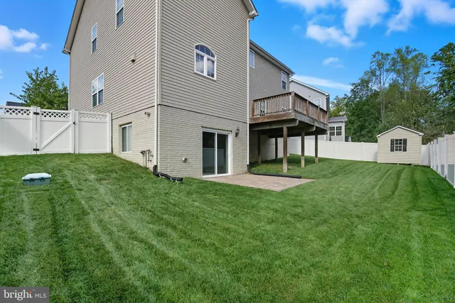 a view of a backyard with plants
