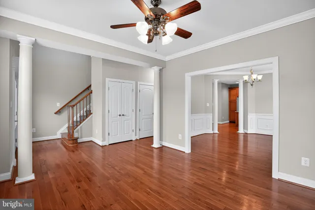 a view of an entryway with wooden floor