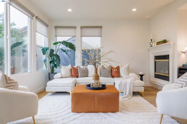 a spacious bedroom with a bed and a window