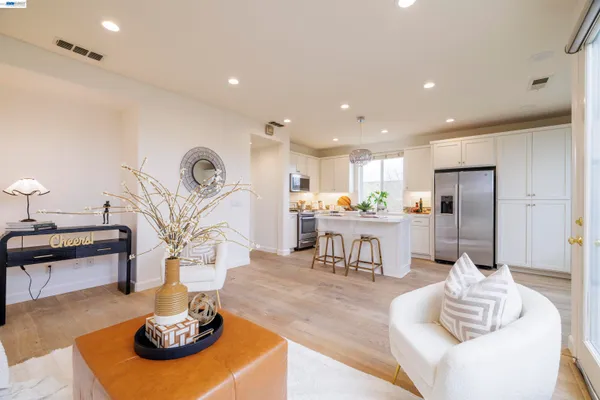 a bedroom with furniture and a window
