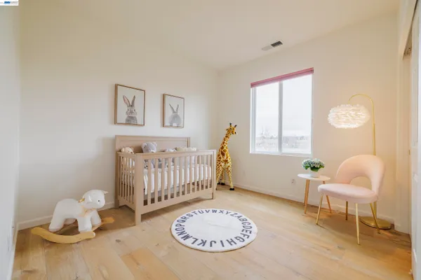 a bathroom with a toilet a sink and a mirror