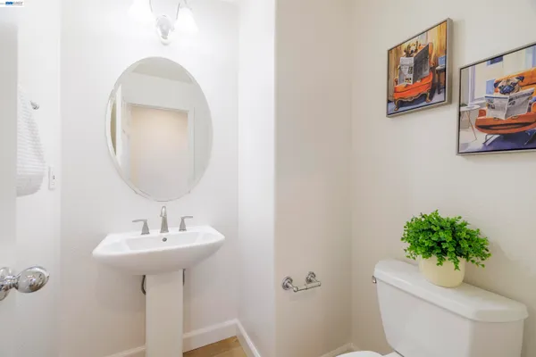 a view of a hallway with a flower pot