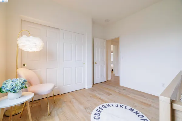 a view of house with garden space and trees