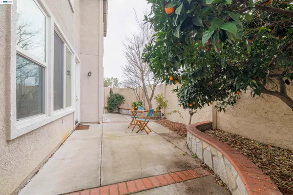 an aerial view of a house with a garden and swimming pool