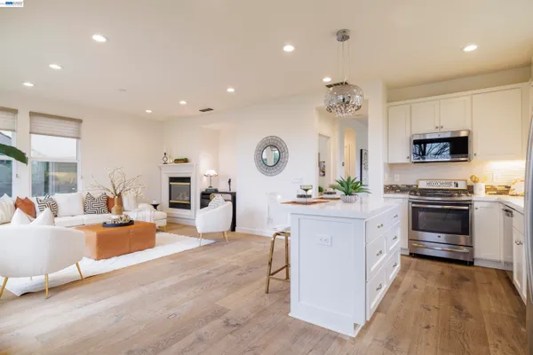 a very nice looking living room with a large window