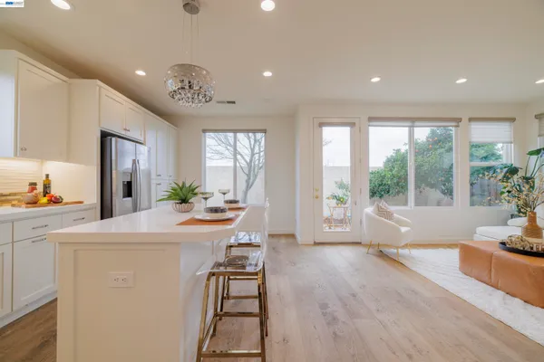 a view of a livingroom with furniture and a dinning area