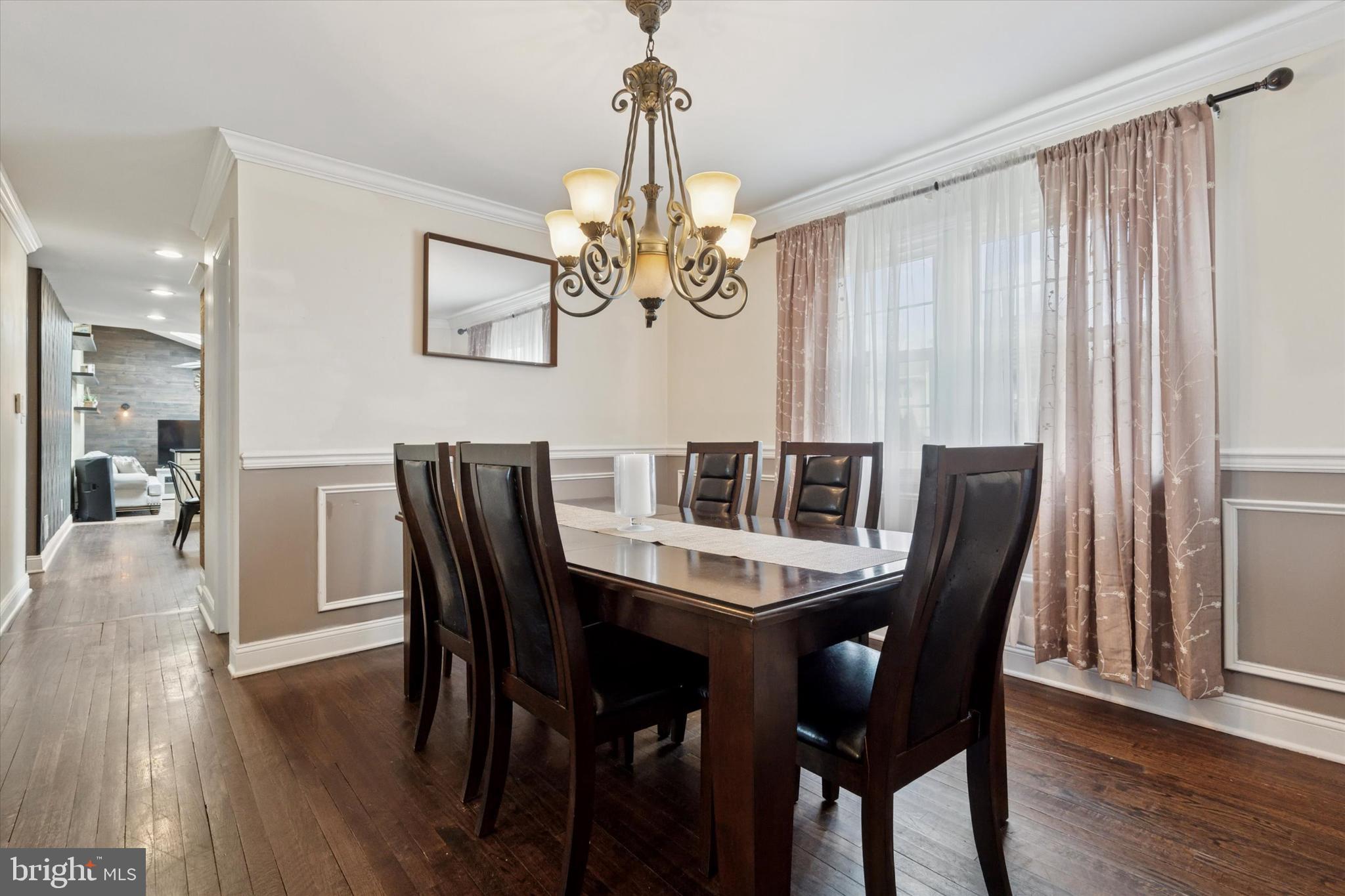2310 Klockner Road Hamilton, NJ 08690 - Photo 11 of 33 a view of a dining room with furniture wooden floor and chandelier