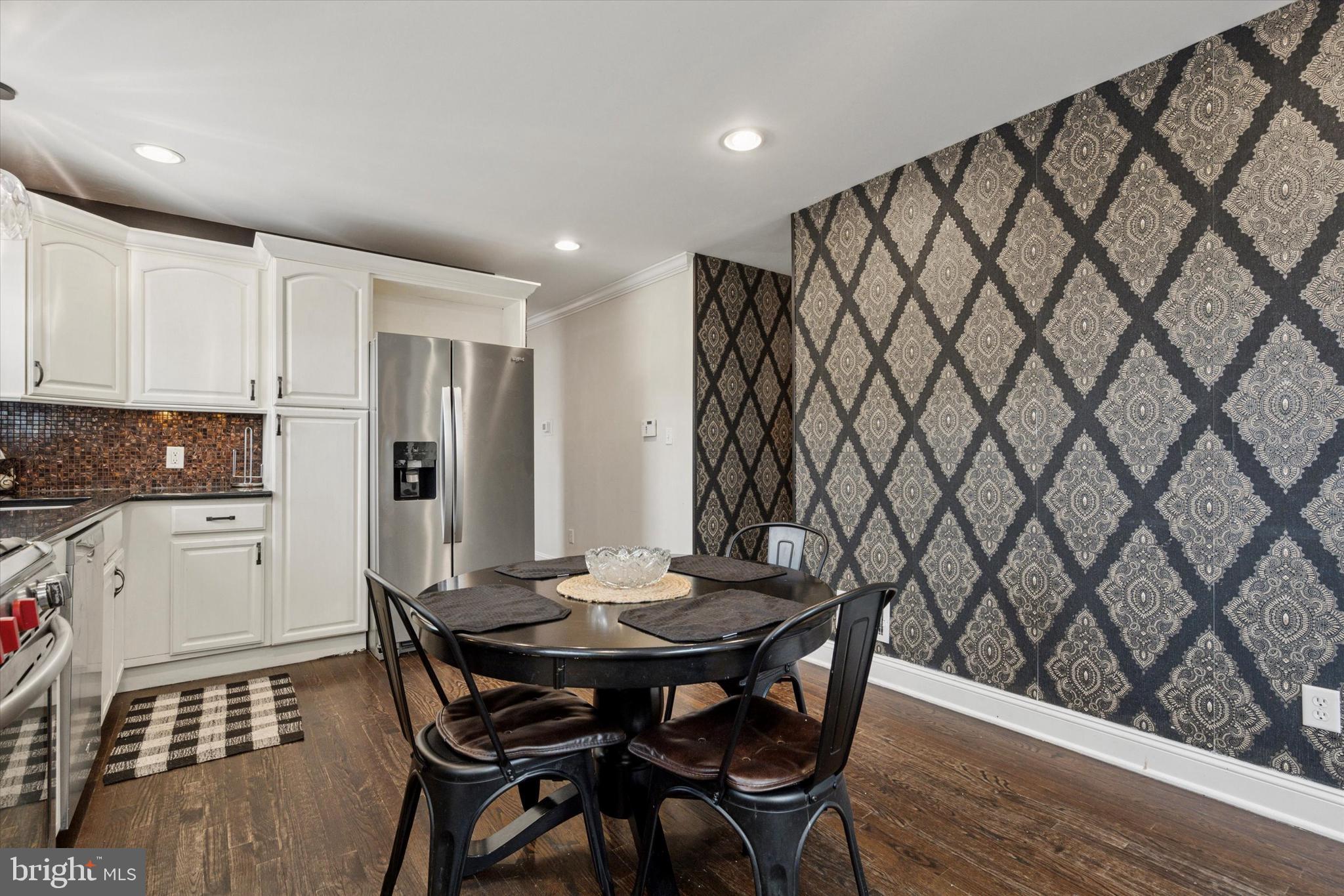 2310 Klockner Road Hamilton, NJ 08690 - Photo 19 of 33 a view of a dining room with furniture and wooden floor