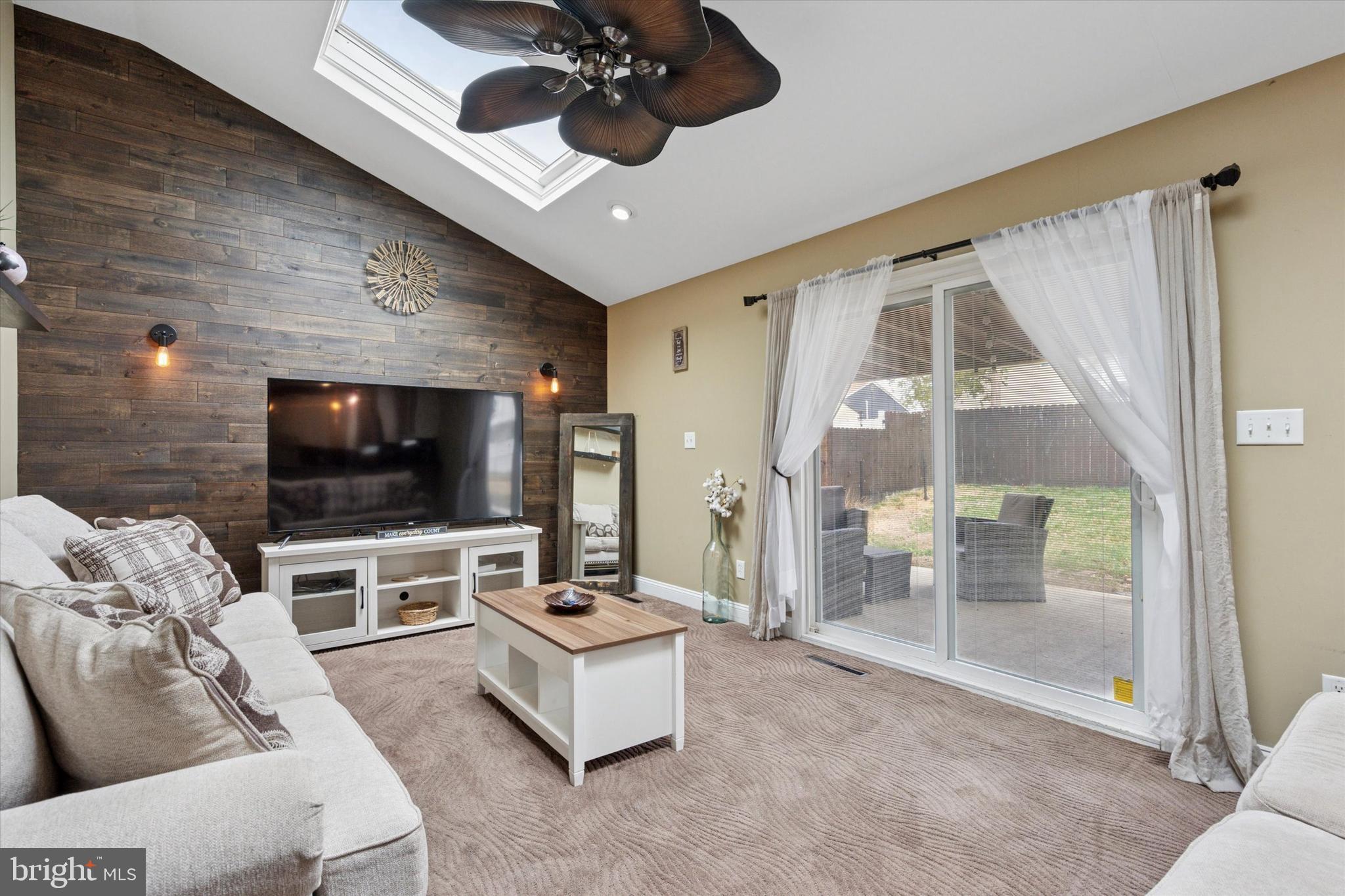 2310 Klockner Road Hamilton, NJ 08690 - Photo 21 of 33 a living room with furniture and a flat screen tv