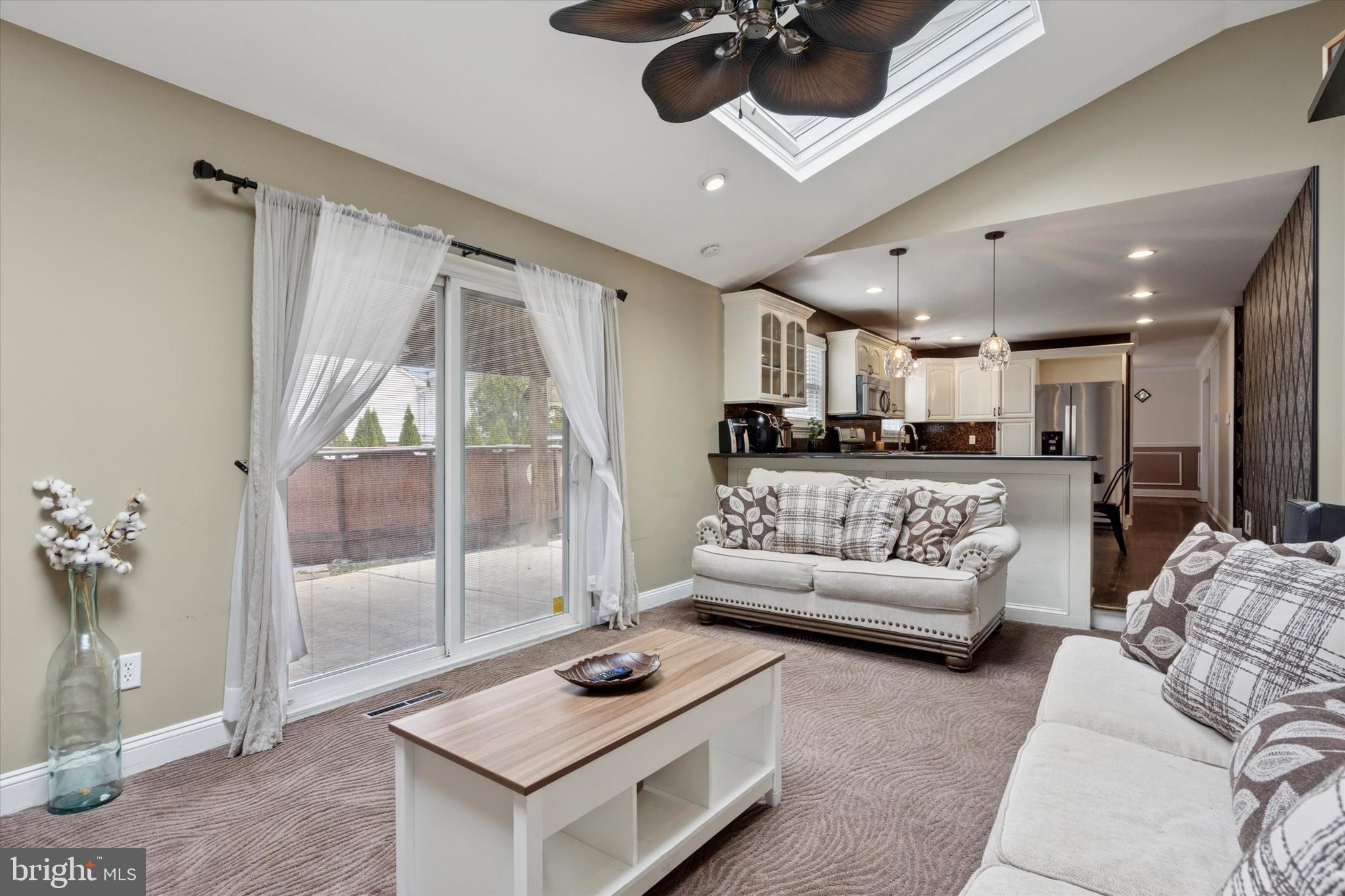 2310 Klockner Road Hamilton, NJ 08690 - Photo 24 of 33 a living room with furniture and a large window