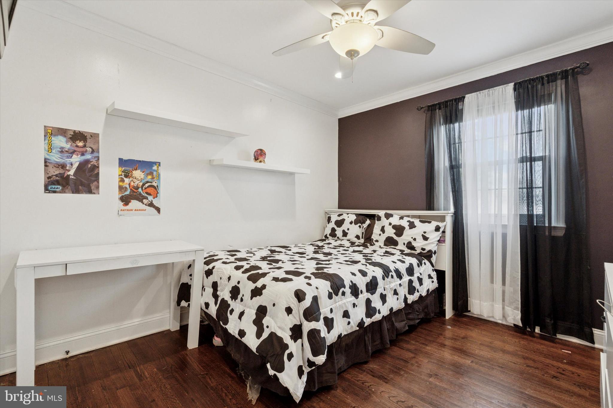 2310 Klockner Road Hamilton, NJ 08690 - Photo 30 of 33 a bedroom with a large bed and a chandelier