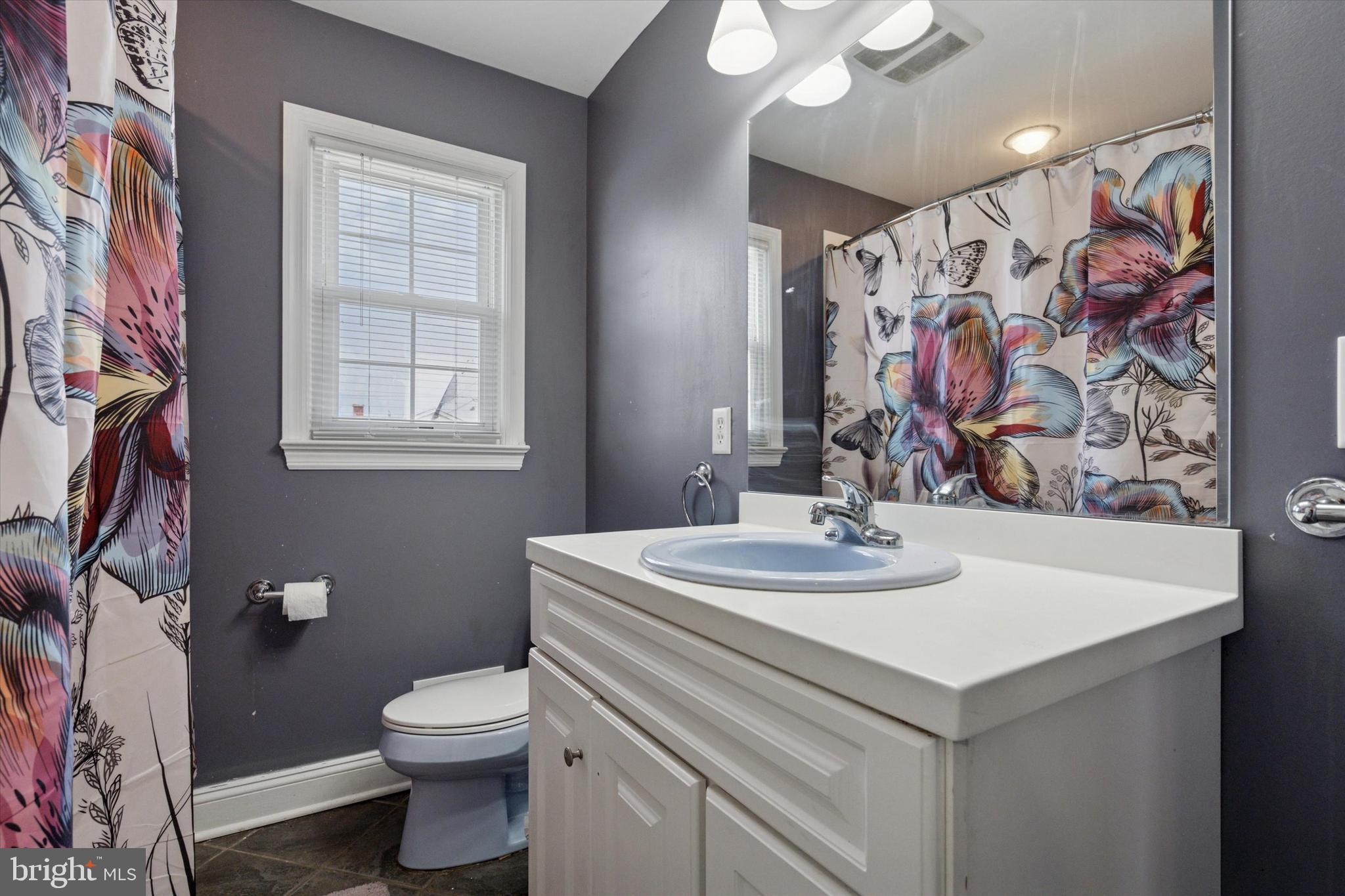 2310 Klockner Road Hamilton, NJ 08690 - Photo 31 of 33 a bathroom with a sink toilet and shower
