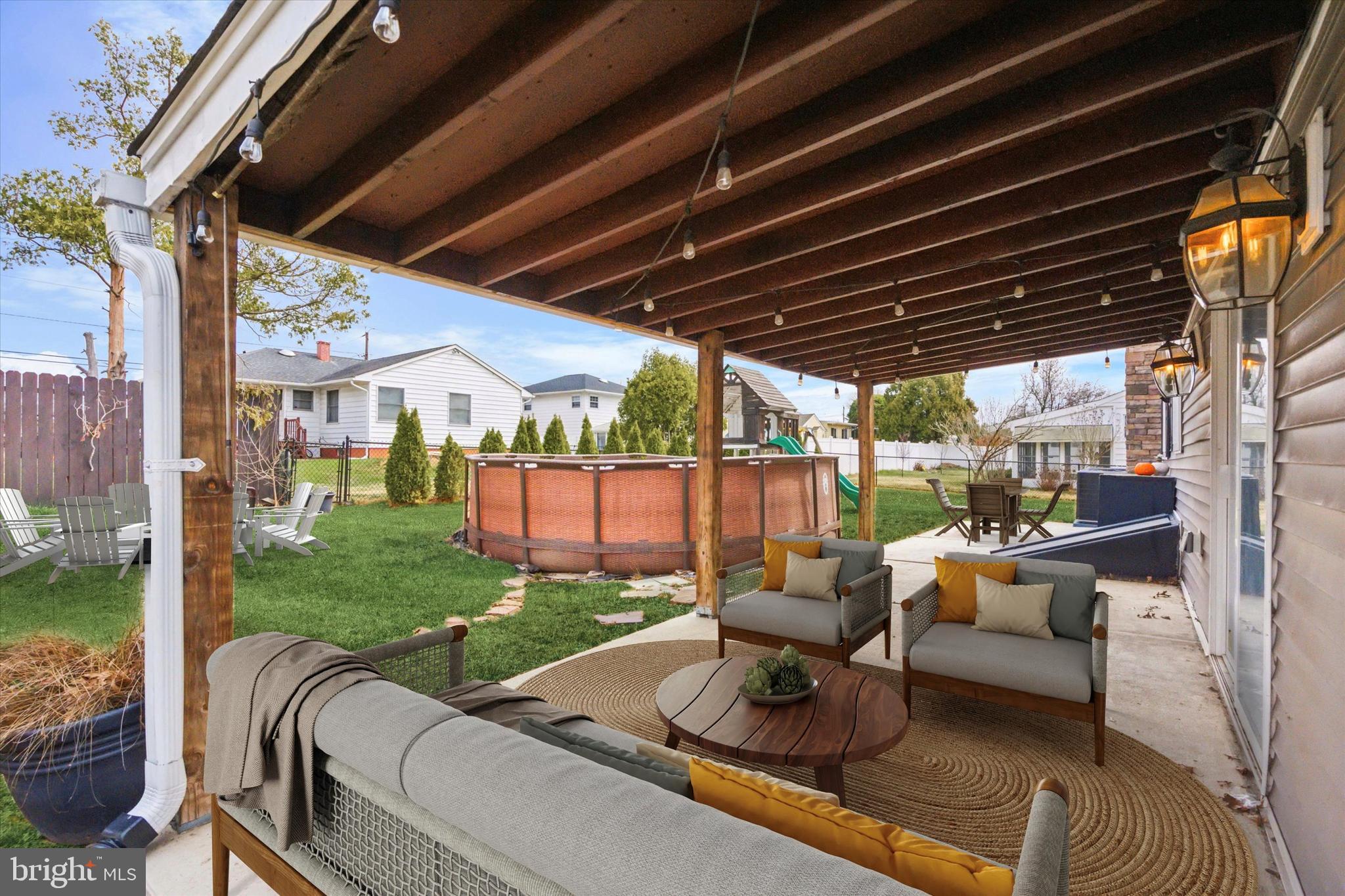 2310 Klockner Road Hamilton, NJ 08690 - Photo 32 of 33 a view of a patio with couches chairs and a big yard